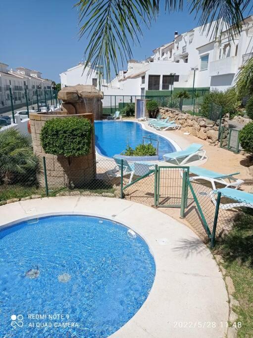 ベヘール・デ・ラ・フロンテーラ Agradable Adosado Con Piscinaヴィラ エクステリア 写真